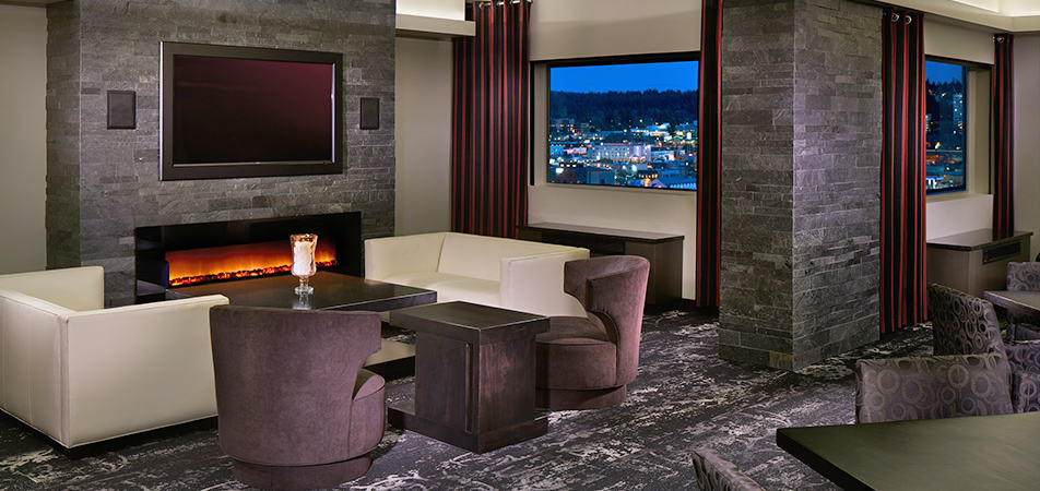 Davenport Grand Governor suite | Couch and fireplace