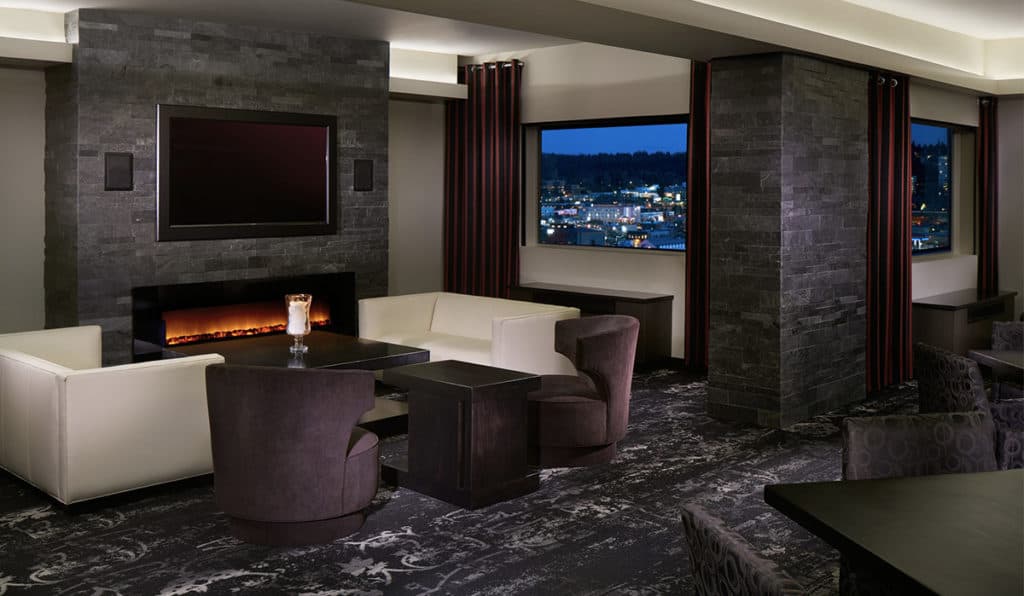 Governor Suite couch and fireplace | Davenport Grand