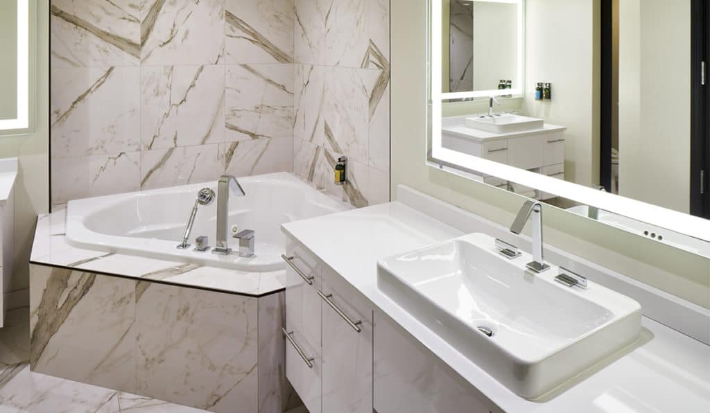 Governor Suite Bathroom | Tub and sink | Davenport Grand