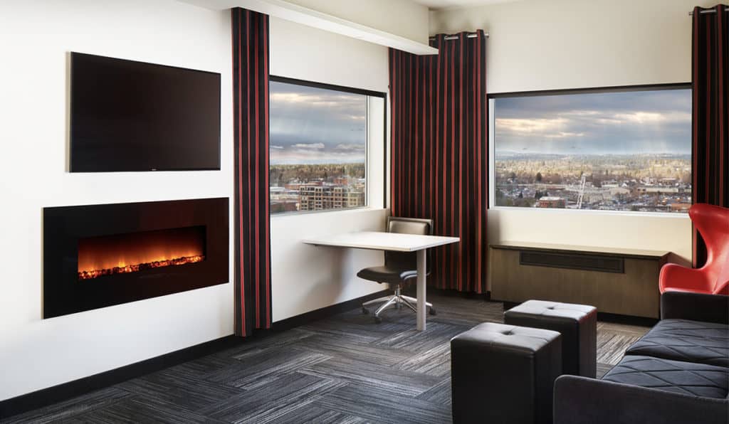 Davenport Grand | Penthouse Suite living area | Fireplace