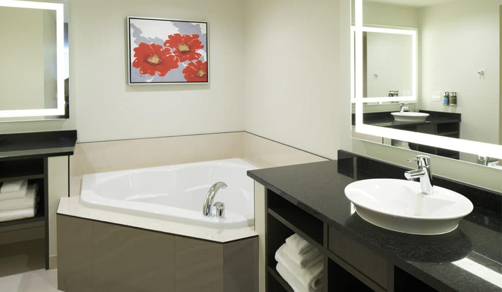 Davenport Grand | Penthouse Suite Bathroom Tub and Sink