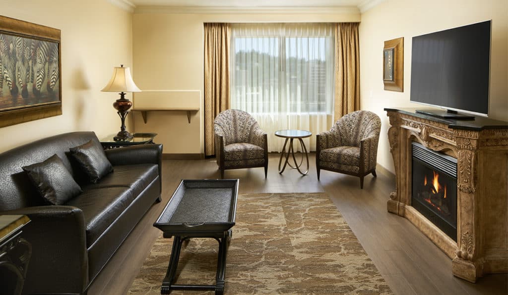 Davenport Tower suites living area | couch and fireplace