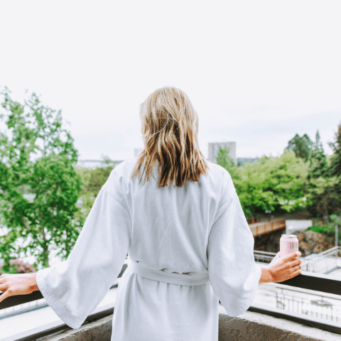 Women on balcony | Davenport Centennial
