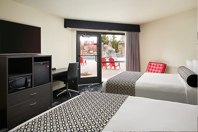 Deluxe Queen Poolside Bedroom | Davenport Centennial