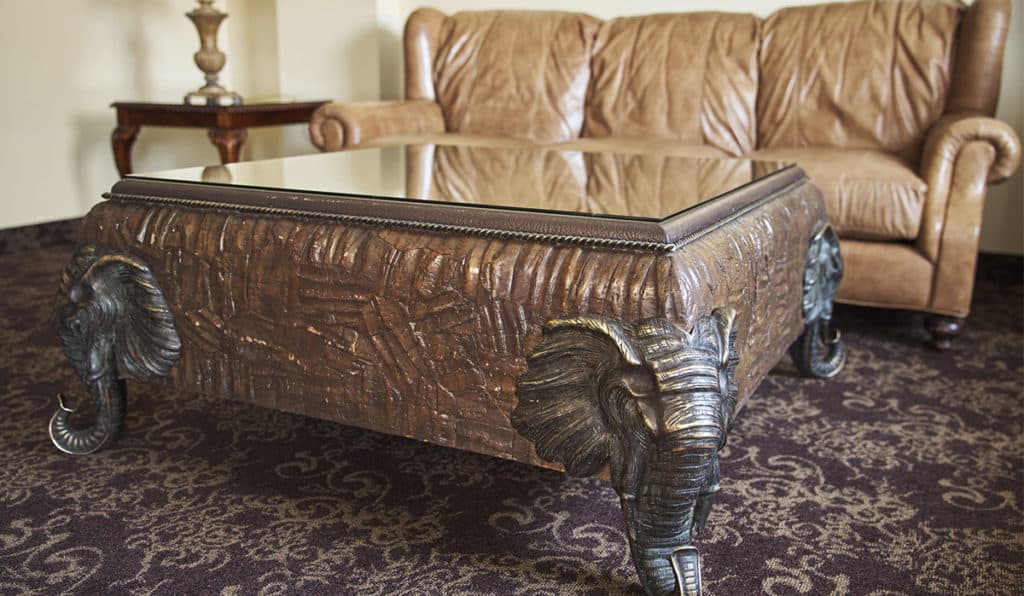 Table with elephant face legs | Apartments Room | Historic Davenport